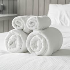 white towels on the bed